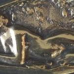 Bronzov relif s lec nahou dvkou
