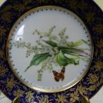 Tři talíře s květinami a motýly Tři talíře s květinami a motýly