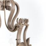 Zrestaurovaný kovový lustr Zrestaurovaný kovový lustr