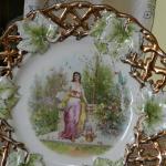 Zlacený dekorativní talíř s antickým motivem Zlacený dekorativní talíř s antickým motivem