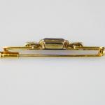 Art deco zlatá brož s diamanty a safírem Art deco zlatá brož s diamanty a safírem