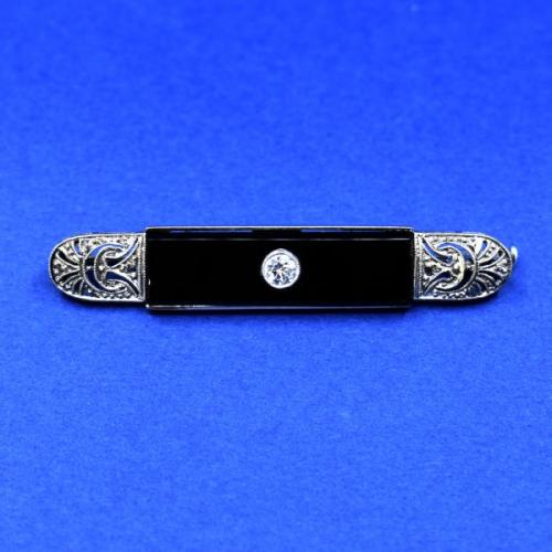 Zlatá art deco brož s onyxem a briliantem, 1920 Zlatá art deco brož s onyxem a briliantem, 1920