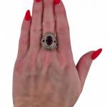 Stříbrný  prsten s fialovým kamenem a markazity Stříbrný  prsten s fialovým kamenem a markazity