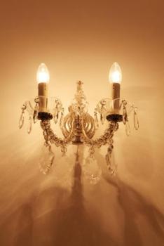 Párové douramenné nastěnné lampy. Křišťál Párové douramenné nastěnné lampy. Křišťál