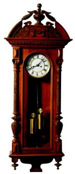 Hodiny v dřeveném pouzdru na zeď Hodiny v dřeveném pouzdru na zeď