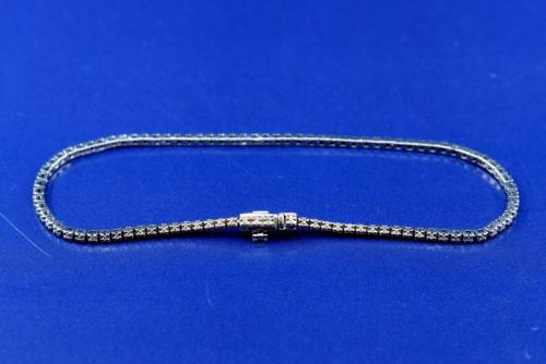Zlatý tenisový náramek s brilianty, 1960 Zlatý tenisový náramek s brilianty, 1960