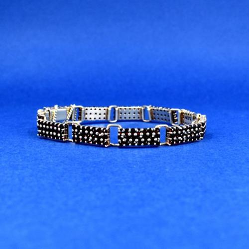 Stříbrný článkový náramek s granáty, 1980 Stříbrný článkový náramek s granáty, 1980