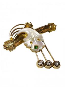 Zlatá brož ve florálním stylu Zlatá brož ve florálním stylu