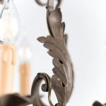 Zrestaurovaný kovový lustr Zrestaurovaný kovový lustr