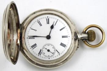 Stříbrné tříplášťové hodinky s festony  Stříbrné tříplášťové hodinky s festony