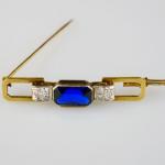 Art deco zlatá brož s diamanty a safírem Art deco zlatá brož s diamanty a safírem