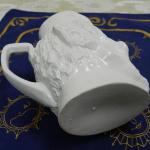 Figurální porcelánový korbel, čert Figurální porcelánový korbel, čert