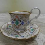 Zlacený hrnek s podšálkem - K.C. PRAG Zlacený hrnek s podšálkem - K.C. PRAG