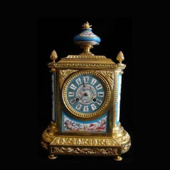 Bronzové hodiny s miniaturami Bronzové hodiny s miniaturami