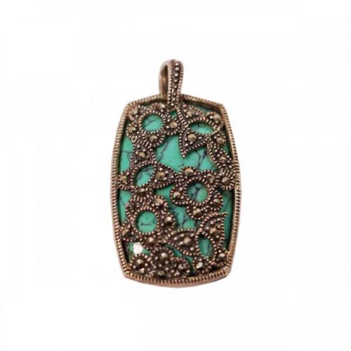 Stříbrný přívěsek s markazity na tyrkysovém kameni Stříbrný přívěsek s markazity na tyrkysovém kameni