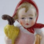 Holčička se žlutým deštníkem Holčička se žlutým deštníkem