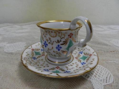 Zlacený hrnek s podšálkem - K.C. PRAG Zlacený hrnek s podšálkem - K.C. PRAG