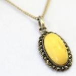 Stříbrný řetízek s přívěškem s markazity a kostí Stříbrný řetízek s přívěškem s markazity a kostí