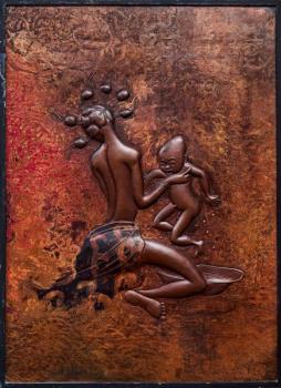 Africký měděný reliéf – motiv mateřství Africký měděný reliéf – motiv mateřství