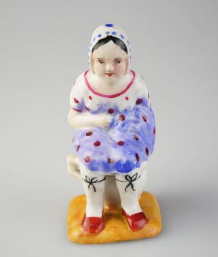 Žertovná porcelánová firgurka Žertovná porcelánová firgurka