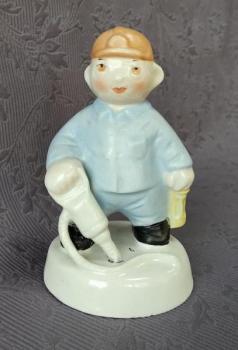 Horník, zn. Royal Dux  Horník, zn. Royal Dux