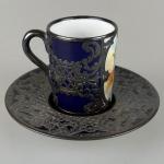 Šálek s podšálkem v montáži Šálek s podšálkem v montáži