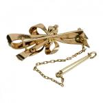 Zlatá brož s briliantem a perličkami Zlatá brož s briliantem a perličkami