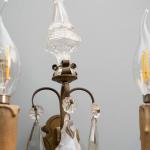 Párové nástěnné lampy z bronzu s křišťálovými ověs Párové nástěnné lampy z bronzu s křišťálovými ověs