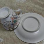 Zlacený hrnek s podšálkem - K.C. PRAG Zlacený hrnek s podšálkem - K.C. PRAG