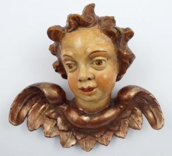 Okřídlená hlavička Putta Okřídlená hlavička Putta