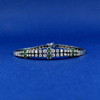 Bílozlatý náramek s brilianty a smaragdy Bílozlatý náramek s brilianty a smaragdy