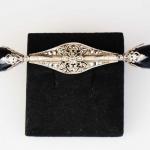 Stříbrná brož s markazity Stříbrná brož s markazity