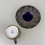 Šálek s podšálkem v montáži Šálek s podšálkem v montáži