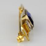 Art deco zlatá brož s diamanty a safírem Art deco zlatá brož s diamanty a safírem