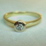 Zlatý prsten s briliantem 0,08 cr kvalita SI/E