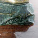 Bronzov figura mue